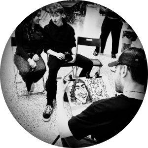 Steven Simon drawing a caricature